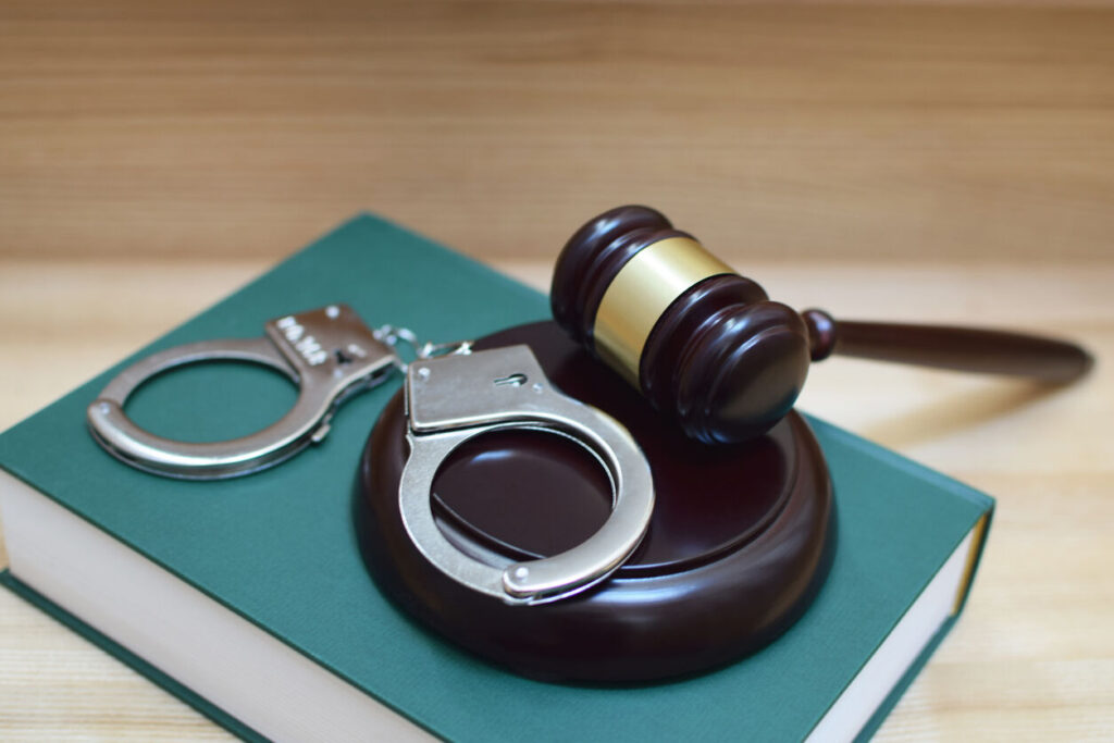 hand cuffs and gavel