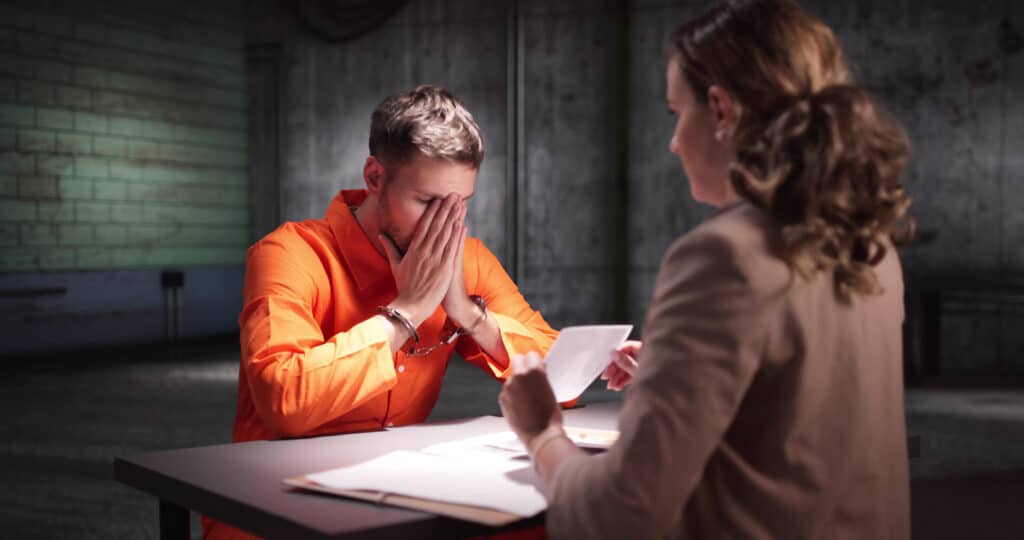 Criminal Defense Attorney In Prison. Police Investigator