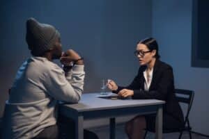 A criminal defense attorney in Hillsboro, Oregon, conducting an interview with a client.