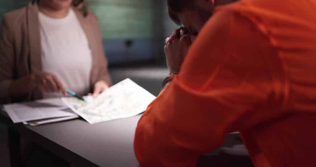 Criminal Defense Attorney In Prison. Police Investigator